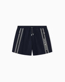 Swim shorts with logo tape