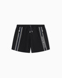 Swim shorts with logo tape