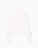 Blouse in recycled crepe with high neckline and tie cuffs