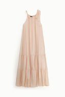 Long sleeveless dress with ruffles and halter neck