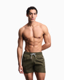 Swim shorts with stitched logo embroidery