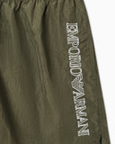 Swim shorts with stitched logo embroidery