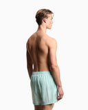 Swim shorts with stitched logo embroidery