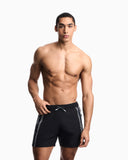 Swim shorts with logo tape