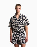 Flower eagle patterned swim shorts