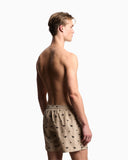 Swim shorts with all-over micro eagle embroidery
