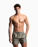 Swim shorts with all-over jacquard logo