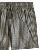Swim shorts with all-over jacquard logo