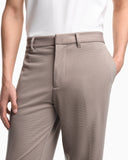 Waffle-effect armure fabric trousers