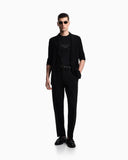 Waffle-effect armure fabric trousers