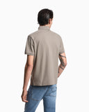 Jersey polo shirt with all-over jacquard lettering