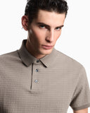 Jersey polo shirt with all-over jacquard lettering