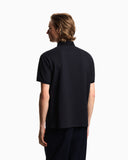 Jersey polo shirt with all-over jacquard lettering