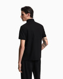 Jersey polo shirt with all-over jacquard lettering