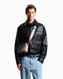 Coated canvas mini bag with all-over eagle