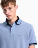 Piqué polo shirt with stripe detail on the collar