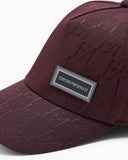 Baseball hat with an embossed logo pattern and a patch