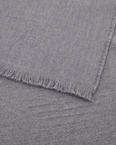 Virgin wool scarf with a woven logo and fringed edges