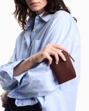 Textured leather billfold wallet with zip-around closure