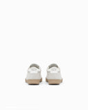Nubuck sneakers with perforated details and a rubber sole