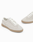 Nubuck sneakers with perforated details and a rubber sole