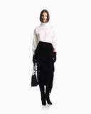Blouse in recycled crepe with high neckline and tie cuffs