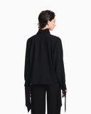 Blouse in recycled crepe with high neckline and tie cuffs