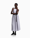 Long dress in poplin with smocked motif