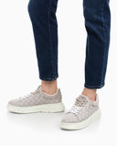 Canvas sneakers with an all-over logo print