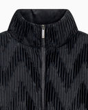 Down jacket in chevron plissé velvet with a full zip