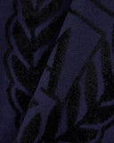 Crew neck pullover with checkered inlay graphic and logo