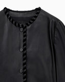 Cropped leather jacket with braided trim and button closure