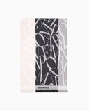 Jacquard logo stole in wool and cashmere with fringed edges
