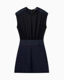 Sleeveless dress with a gathered bodice and front pleat