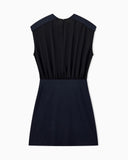Sleeveless dress with a gathered bodice and front pleat
