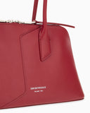 Handbag in smooth leather with top handles and a zip closure