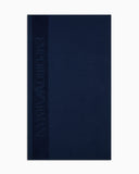 Waffle-weave beach towel with jacquard logo