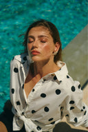 White shirt with black polka dots