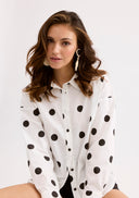 White shirt with black polka dots