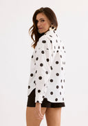 White shirt with black polka dots