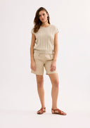 Beige knitted top with short sleeves