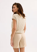 Beige knitted top with short sleeves