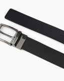 Reversible leather belt with all-over embossed lettering